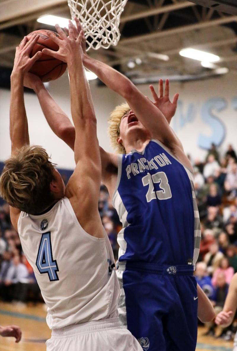 Bureau Valley's Landon Hulsing defends Princeton's Noah LaPorte at the Storm Cellar Thursday night. The Storm won 62-56.