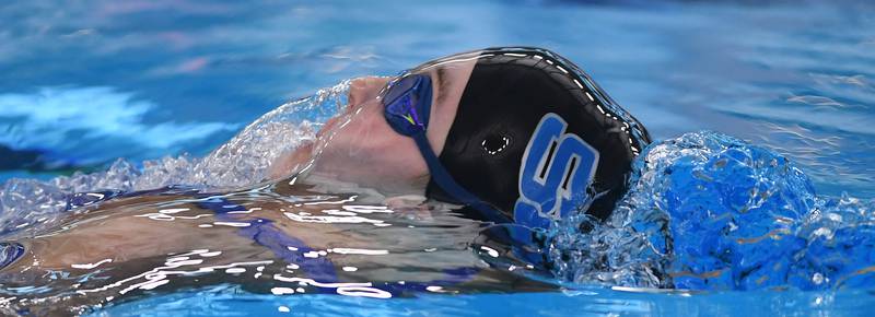 St. Charles North’s Martyna Dobek surfaces while swimming backstroke in the 200-yard medley relay during the girls state swimming preliminaries at the FMC Natatorium on Friday, Nov. 14, 2025 in Westmont.