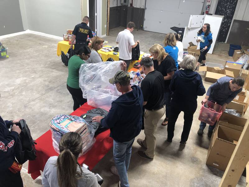 Volunteers joined Kids in Need and Toys for Tots McHenry County on Saturday, May 11, 2024, to stuff 100 care bags for children entering or transitioning in the foster care system.