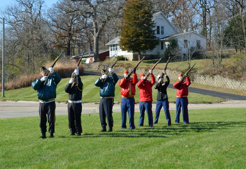 The Dixon Marine Corp Detachment shoots a rifle volley Monday, Nov. 11, 2024, at Dixon Veterans Memorial Park for a Veterans Day ceremony.