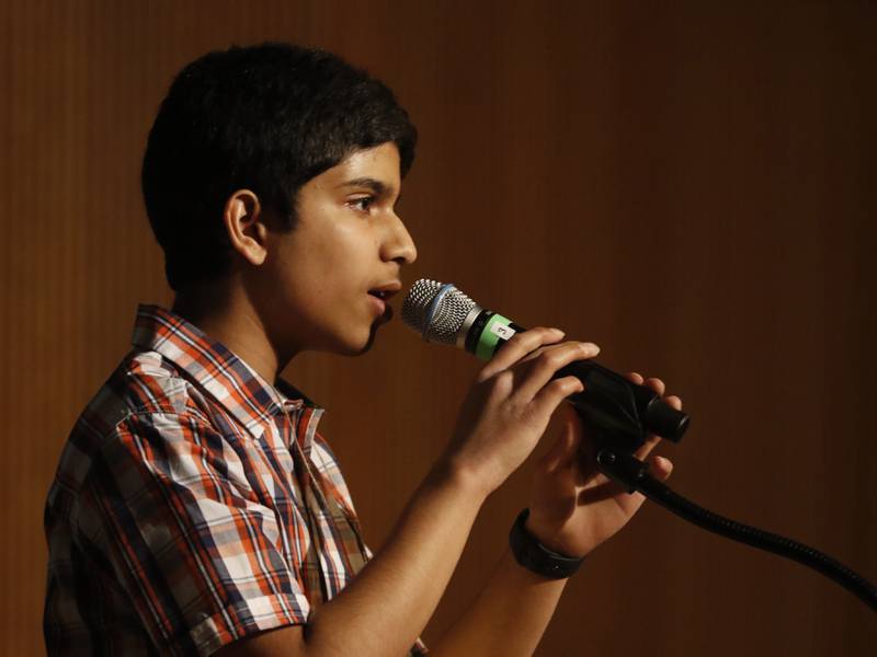 Vishrut Kinikar spells a word on his way to winning the McHenry County Regional Office of Education 2023 Spelling Bee on Wednesday, March 22, 2023, at McHenry County College's Luecht Auditorium in Crystal Lake.