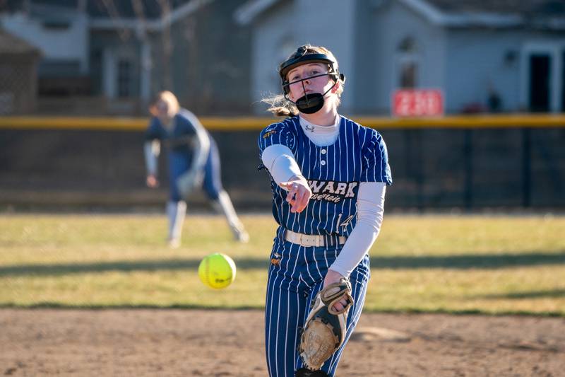 Newark’s Kaitlyn Schofield (14) delivers a pitch against Batavia during a softball game at Batavia High School on Wednesday, Mar 29, 2023.