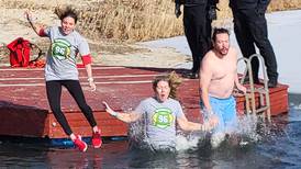 People prepare to brave the elements for Penguin Plunge Winter Festival