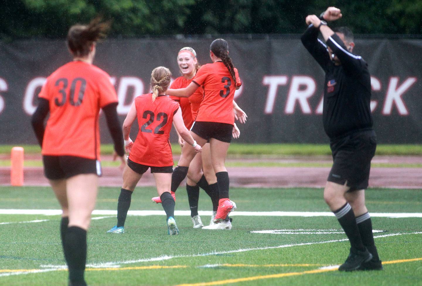 Crystal Lake Central players celebrate a goal by Paiton Hulata during the Class 2A state championship game against Triad at North Central College in Naperville on Saturday, June 1, 2024.