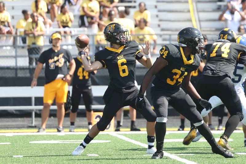 Joliet West’s Adrian Ramirez makes the deep pass against Joliet Central on Saturday, Sept. 23, 2023 in Joliet.