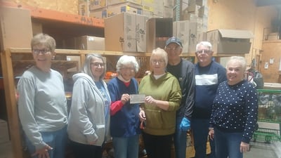 Quartermania donates nearly $1K to Streatorland Food Pantry