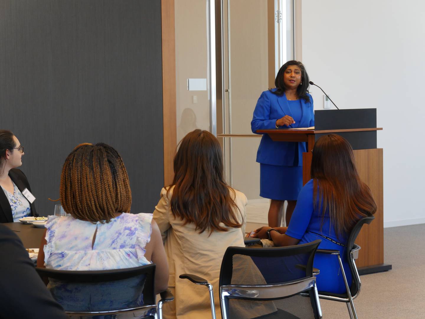 Illinois Appellate Court Justice Rena Van Tine addresses Jumpstart students at an Aug. 3 reception at Jones Day in Chicago. Van Tine was the first female Indian American judge in the nation to serve on a state court and the first to win a county-wide election.