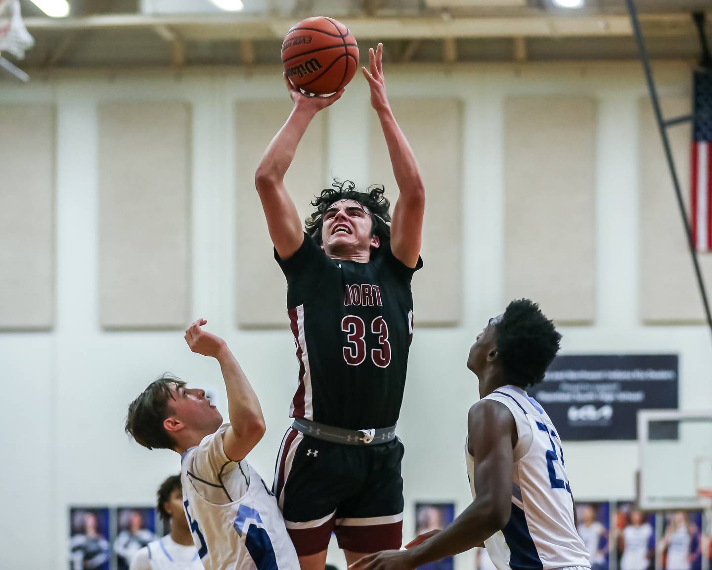 Plainfield North's Jeffrey Fleming (33) puts up a shot during basketball game between Plainfield North at Plainfield South. Jan 5, 2024.