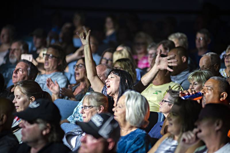 Fans get into the action Friday, Aug. 19, 2022 with band Double Vision.