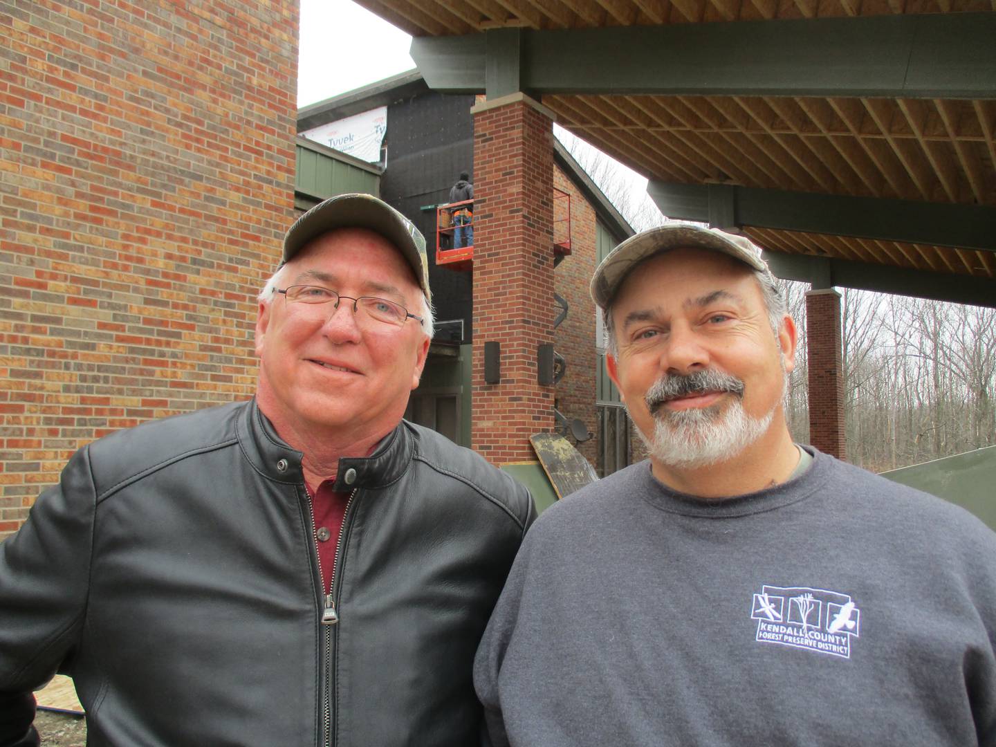 Kendall County Forest Preserve District President Brian DeBolt, left, and District Director Dave Guritz are seen here March 2, 2023 outside the Pickerill house.