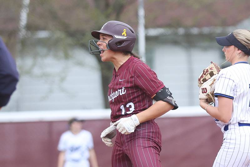 Lockport’s Anna Lundstedt celebrates a pinch hit double against Lincoln-Way East on Monday, April 13, 2026 in Lockport.