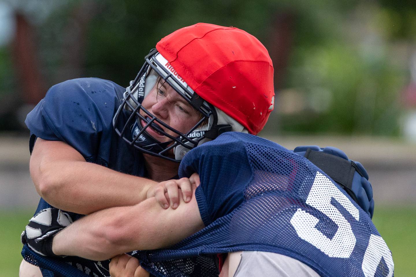 Chance Hedrick of Fieldcrest pushes Aiden Elder of Prairie Central on Thursday, July 17, 2025 at Dwight High School in Dwight.