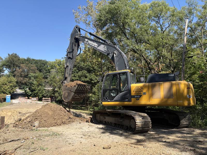 An excavator scoops dirt at the Kelly Street Bridge project on Monday, Sept. 15, 2025.