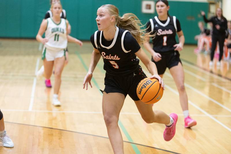 St. Charles East's Brooklyn Schilb leads a breakaway against York at the York Girl's Thanksgiving Tournament on Tuesday, Nov. 18,2025 in Elmhurst.
