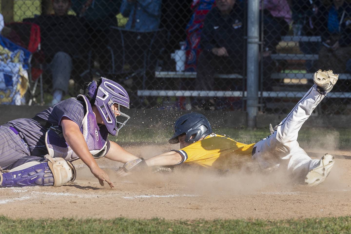 Sterling’s Cale Nettleton is tagged out at home against Friday, May 23, 2025.