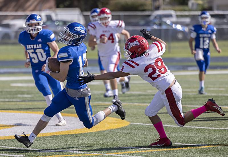 Newman’s Carter Rude avoids Hall’s Deanthony Weatherspoon Saturday, Oct. 7, 2023 in Sterling.