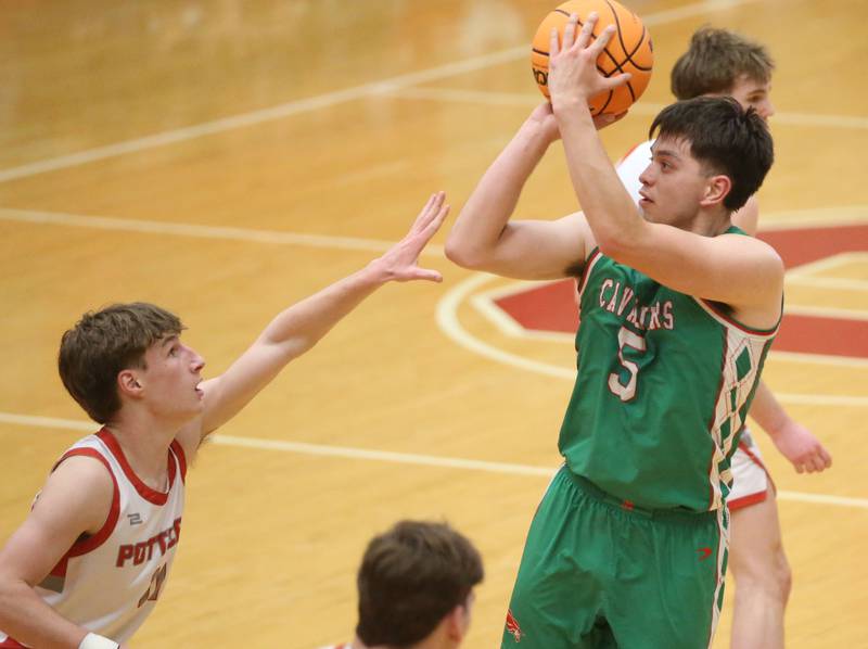 L-P's Erick Sotelo shoots a jump shot over Morton's Owen Adams during the Class 3A Sectional semifinal game on Tuesday, March 3, 2026 in Kingman Gymnasium at Ottawa High School.