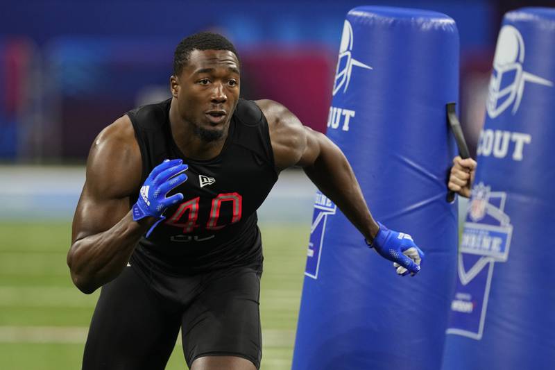 Miami (Ohio) defensive lineman Dominique Robinson runs a drill during the NFL Scouting Combine on Saturday, March 5, 2022, in Indianapolis.