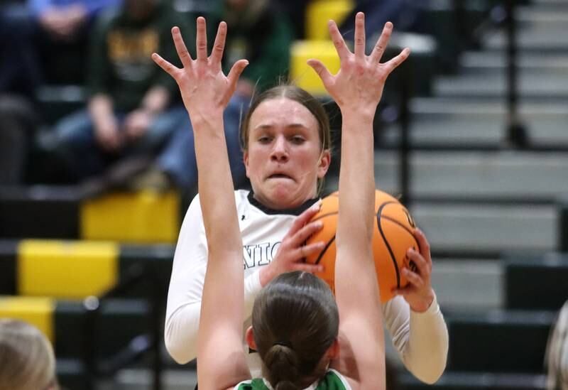 Kaneland’s Grace Brunscheen lands with a rebound in IHSA Class 3A Regional Title Game girls basketball action on Friday, Feb. 21, 2025, at Crystal Lake South High School in Crystal Lake.