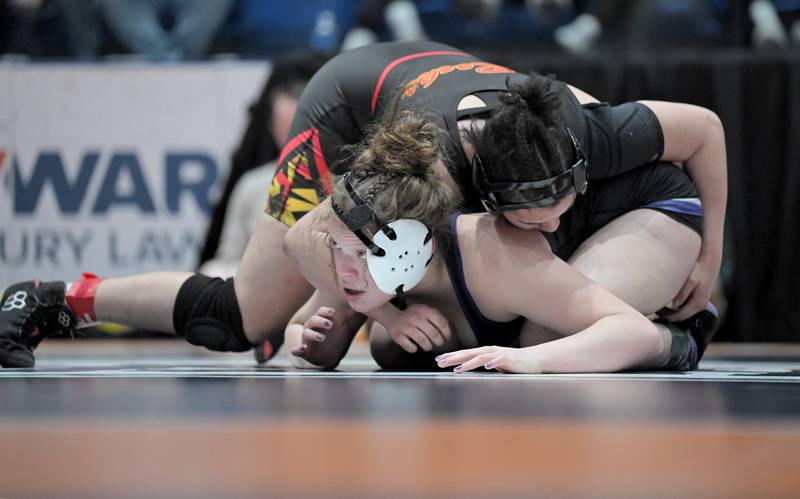 Hampshire’s Samantha Diehl struggles with Rock Island’s Sourtney Walls, top, in the 190-pound class at the girls wrestling state finals tournament at Grossinger Arena in Bloomington on Saturday, Feb. 28, 2026.