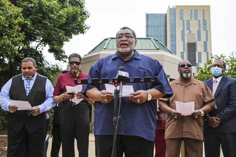 Pastor Warren Dorris speaks to the media Wednesday, Jun. 3, 2020, during a press conference addressing the physical actions taken by Mayor Bob O'Dekirk against a protestor during a demonstration Monday night in Joliet, Ill.