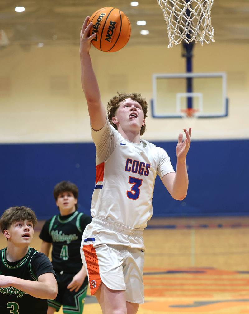 Genoa-Kingston's Jack Peterson gets to the basket ahead of North Boone's Gage Vermett during their Class 2A regional game Monday, Feb. 24, 2025, at Genoa-Kingston High School.