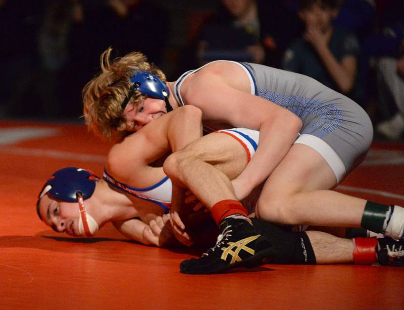 Princeton’s Augustus Swanson (top) and Oregon’s Isaiah Perez wrestle in the third place match at 120 pounds at the 1A Oregon Regional on Saturday, Feb. 15, 2025.