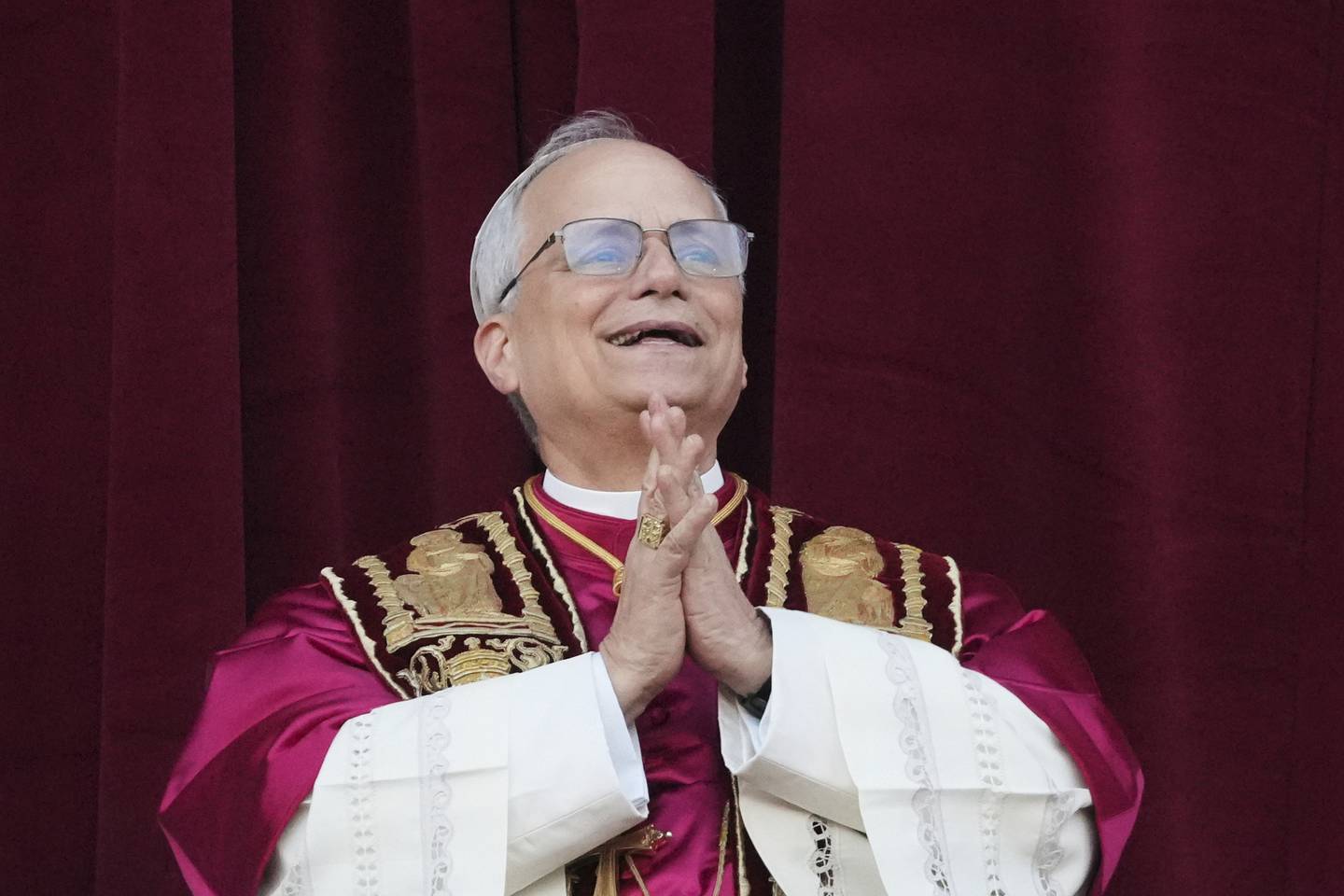 Newly elected Pope Leo XIV appears at the balcony of St. Peter's Basilica at the Vatican, Thursday, May 8, 2025. (AP Photo/Alessandra Tarantino)