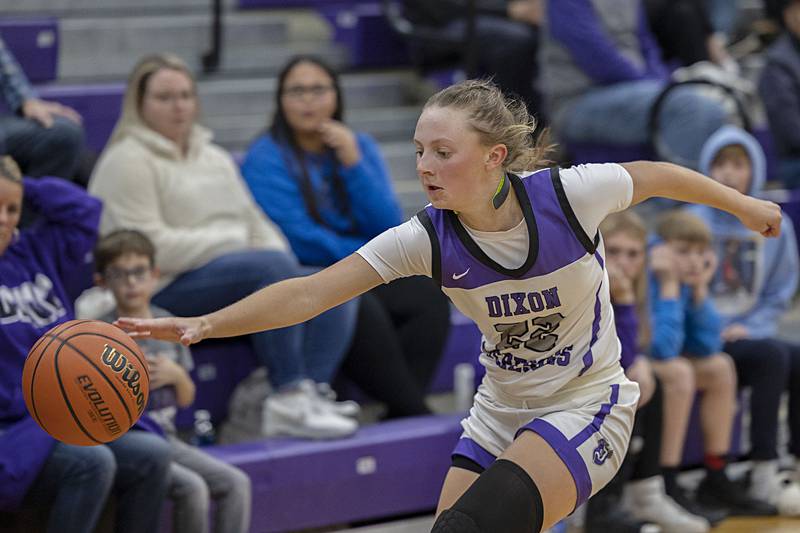 Dixon’s Katie Drew chases down a loose ball Wednesday, Nov. 30, 2022 against Ottawa.