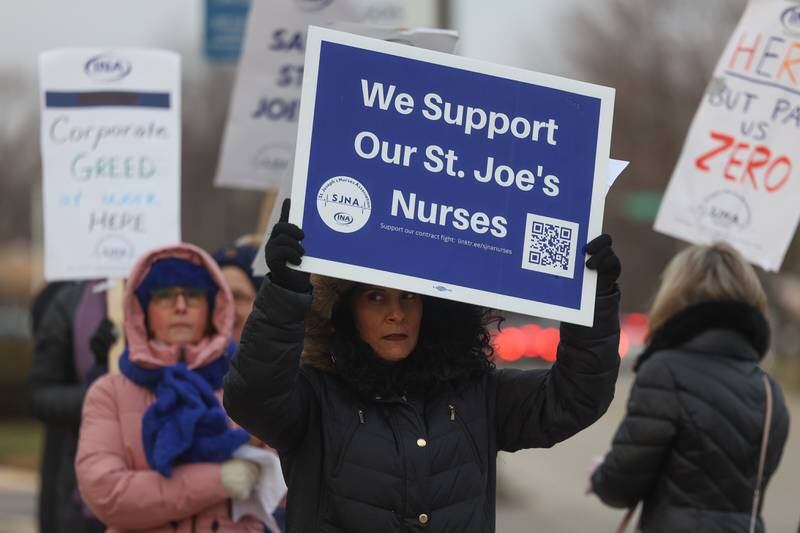 A group of nurses along with the Warehouse Workers for Justice picket outside Ascension Saint Joseph Hospital in Joliet on Wednesday, Dec. 6th, 2023.