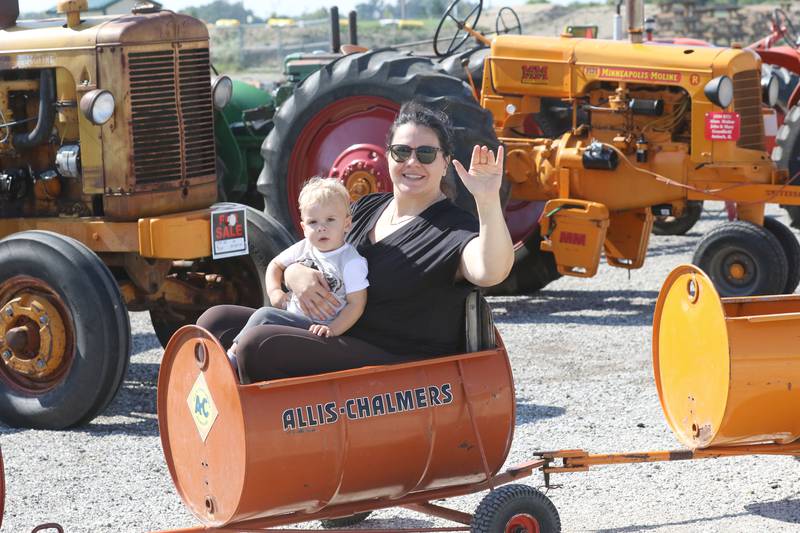 Tanja Savatic, of Grayslake and her son, Mihailo, eighteen-months-old, wave as they take a ride in a barrel train during the Lake County Farm Heritage & Harvest Festival at the Lake County Fairgrounds on September 23rd in Grayslake. The festival was sponsored by the Lake County Farm Heritage Association.
Photo by Candace H. Johnson for Shaw Local News Network