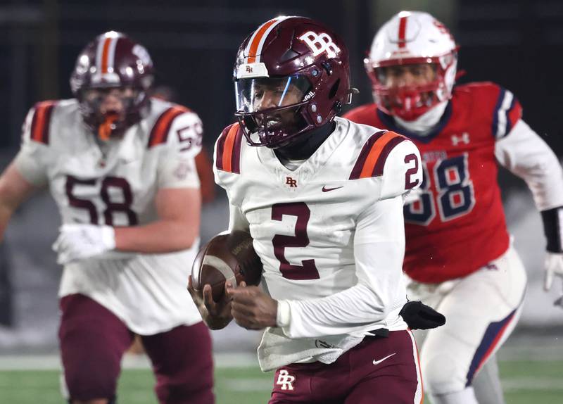 Brother Rice's C.J. Gray gets past the St. Rita defense for a big gain Wednesday, Dec. 3, 2025, during their IHSA Class 7A state chamionship game in Huskie Stadium at Northern Illinois University in DeKalb.