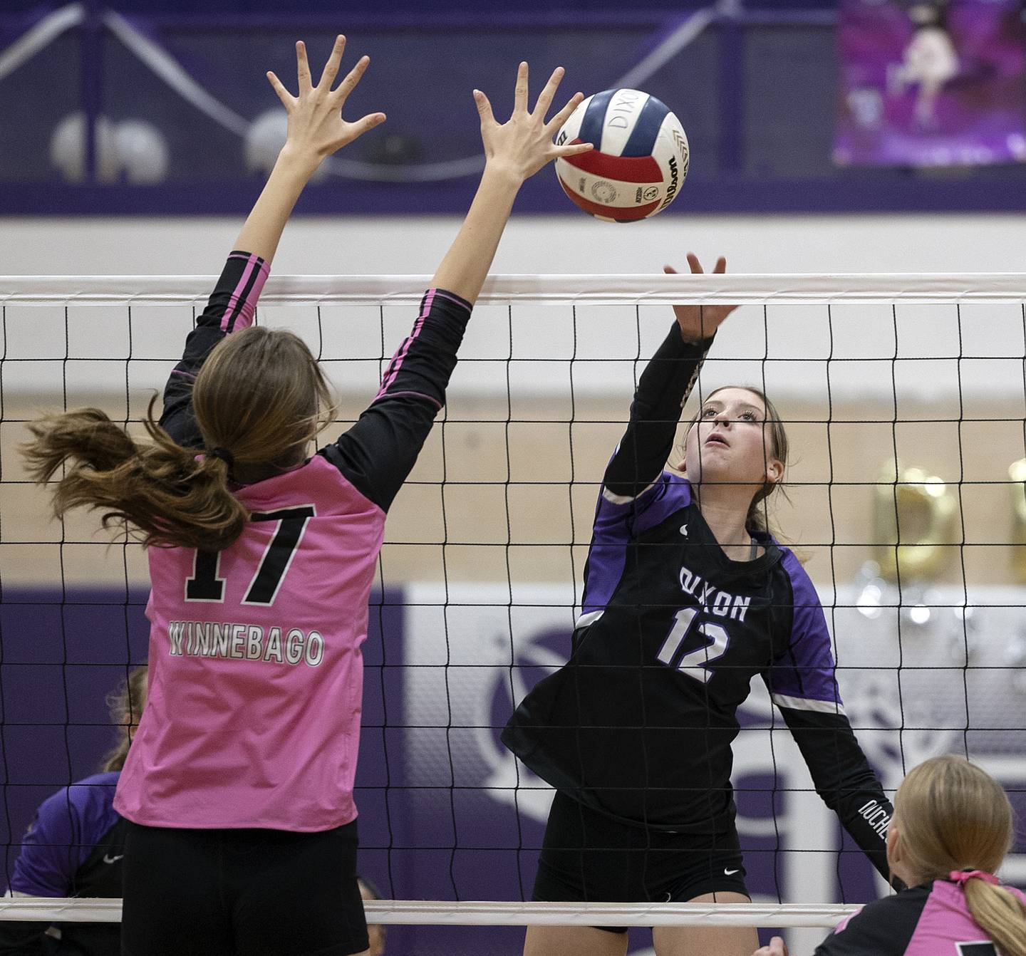 Dixon’s Isabelle Quackboerner works the net against Winnebago’s Hannah Bertram Tuesday, Oct. 22, 2024, in Dixon.