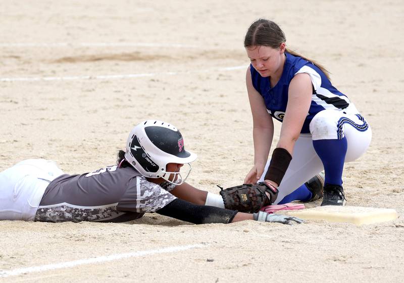 Kishwaukee Valley Storm's Alaynna Johnson slides in safely at third Friday, June 27, 2025, during their 16u game against Northern Ice in the Storm Days tournament at the Sycamore Community Sports Complex.
