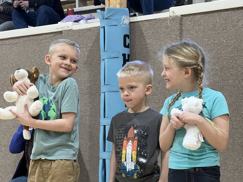 Ben, Max, and Lily Gnade of Frankfort watch as their bridge is tested during the 9th 4-H Bridge Bust in Yorkville.