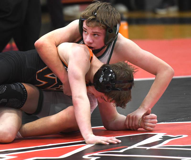West Carroll's Bryson Bunn hold's Winnebago's  Parker McGlinn in the 120-pound battle for third place at the 1A Stillman Valley Sectional on Saturday, Jan. 31, 2026 at Stillman Valley High School.