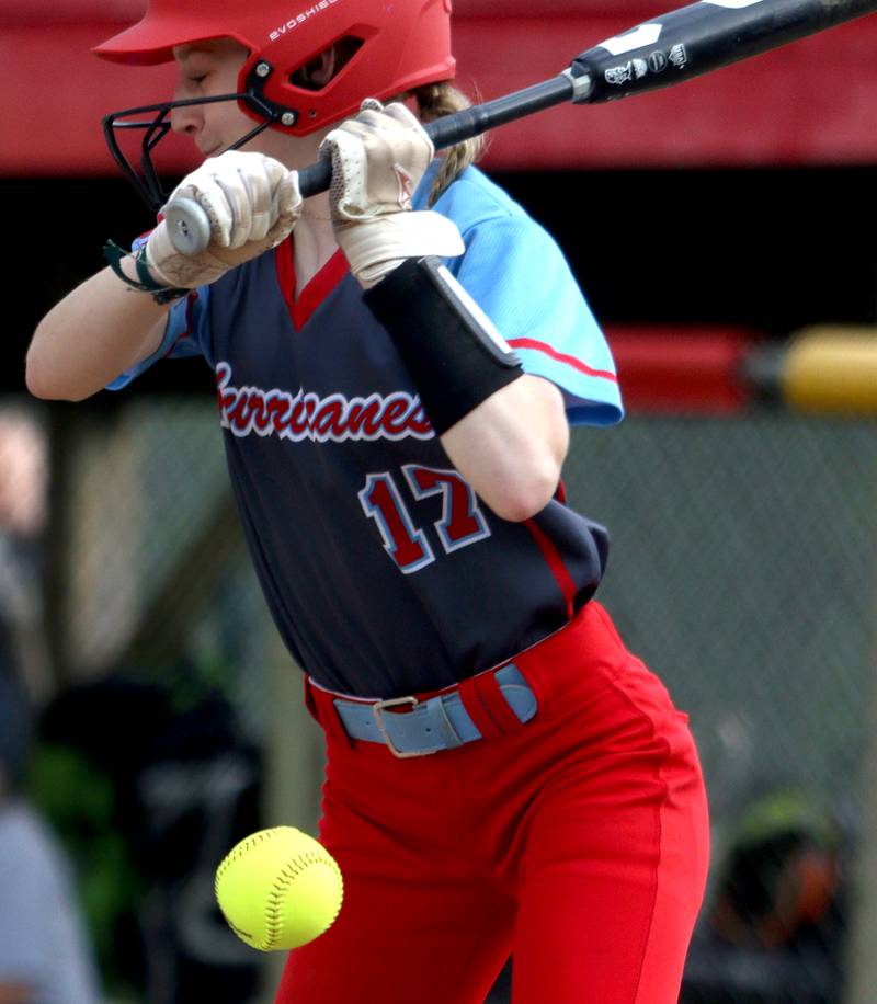 Marian Central’s Bailey Keller is hit by a pitch as the Hurricanes faced Winnebago to begin an IHSA Class 2A Regional game at Raymond Benoy Field in Woodstock Monday.