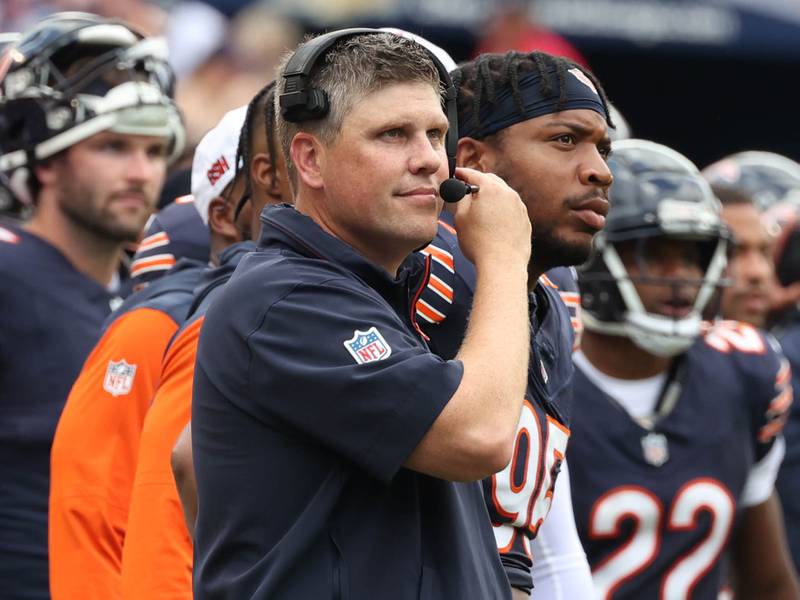 Chicago Bears offensive coordinator Shane Waldron smiles after watching quarterback Caleb Williams engineer a scoring drive during their August 2024 game against the Cincinnati Bengals at Soldier Field in Chicago.