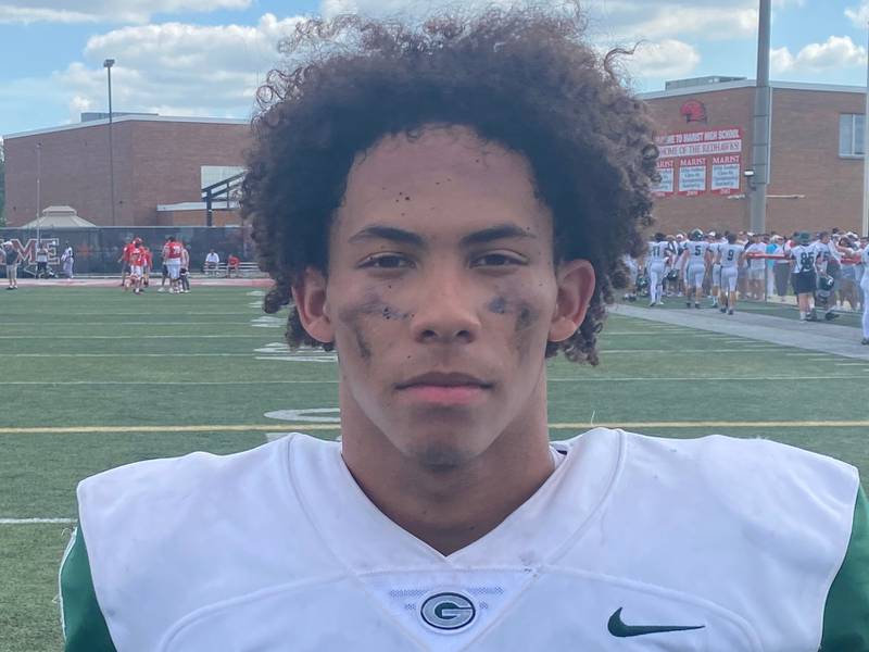 Glenbard West's Julius Ellens showed off his versatility and scored four touchdowns to help the Hitters beat Marist 33-31 on Saturday.
