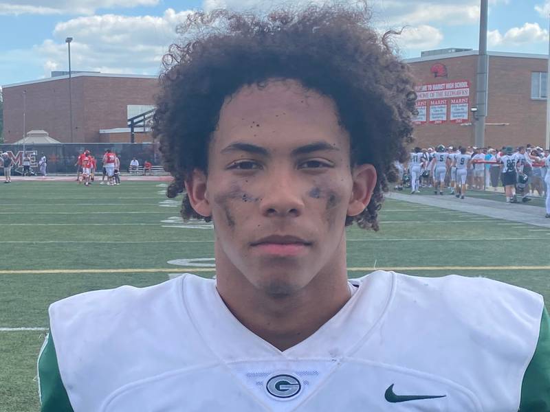Glenbard West's Julius Ellens showed off his versatility and scored four touchdowns to help the Hitters beat Marist 33-31 on Saturday.