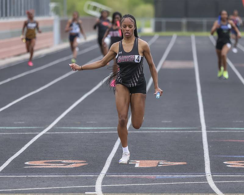 Plainfield North's Taylor McCain anchors to victory in the 4x200m during Southwest Prairie Conference Girls Track and Field Meet Wednesday, May 7, 2025 in Minooka.