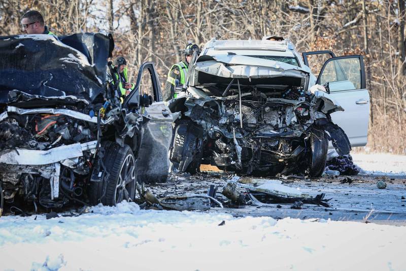 First responders work the scene of a crash on Sunday, Feb. 16, 2025, on Route 14 in Woodstock where one person died and five others were injured.