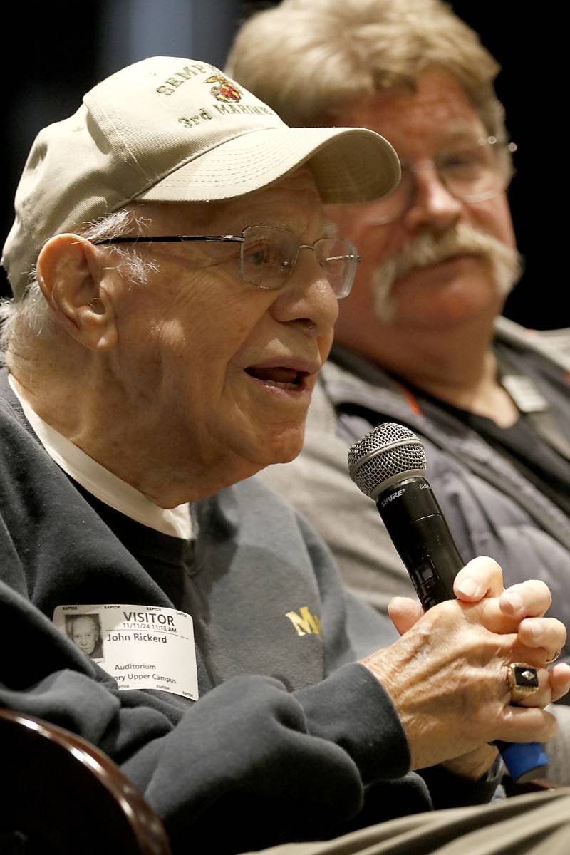 U.S. Marine World War II veteran John Rickerd talks about Iwo Jima during the Veterans Day event on Monday, Nov.11, 2023, at the Upper Campus of McHenry High School.