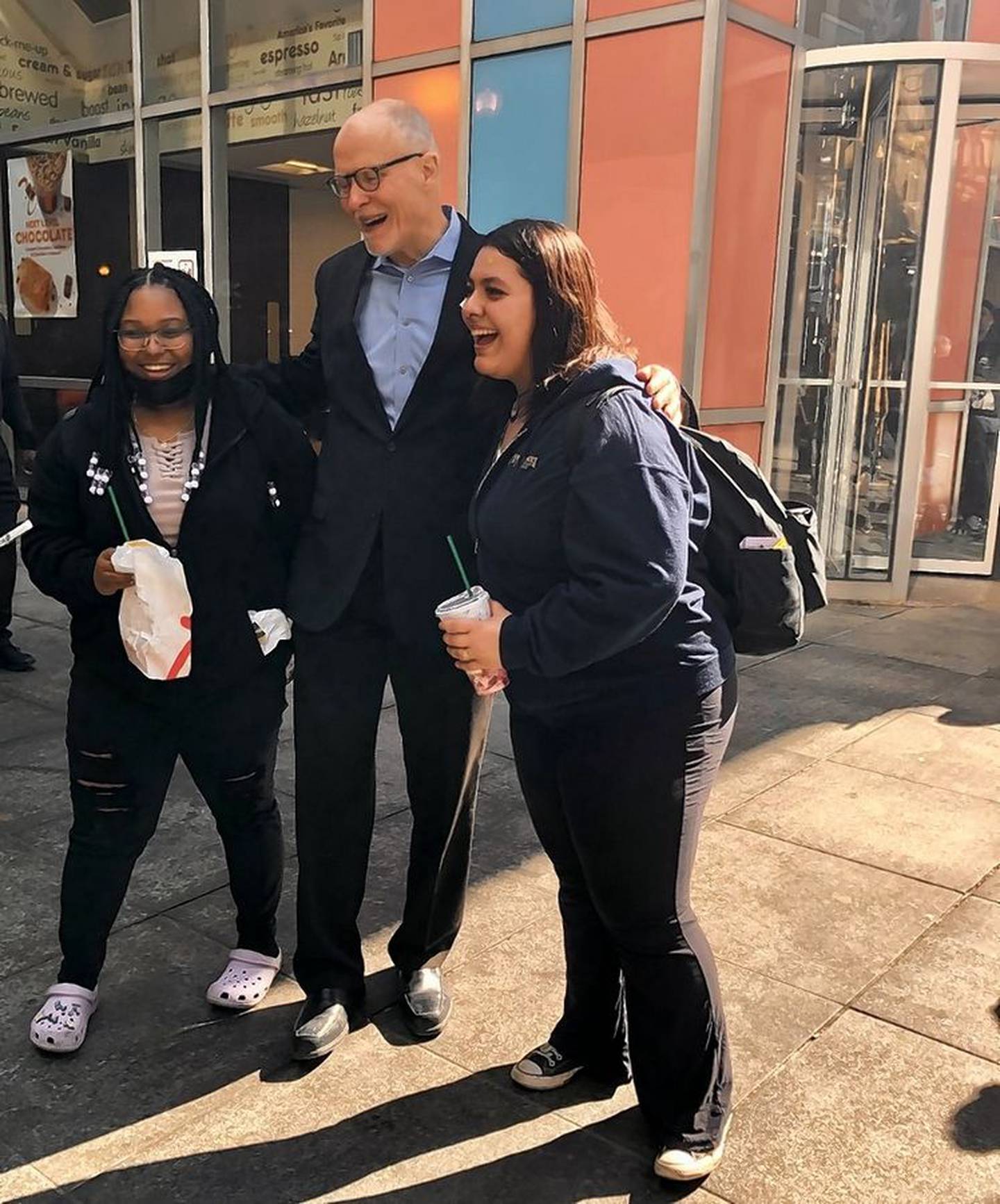 Chicago mayoral candidate Paul Vallas talks with supporters in the Loop March 1.