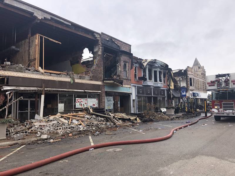 The aftermath on Friday, December 30, 2022 of a fire that caused buildings on the 700 block of downtown Mendota to be a total loss