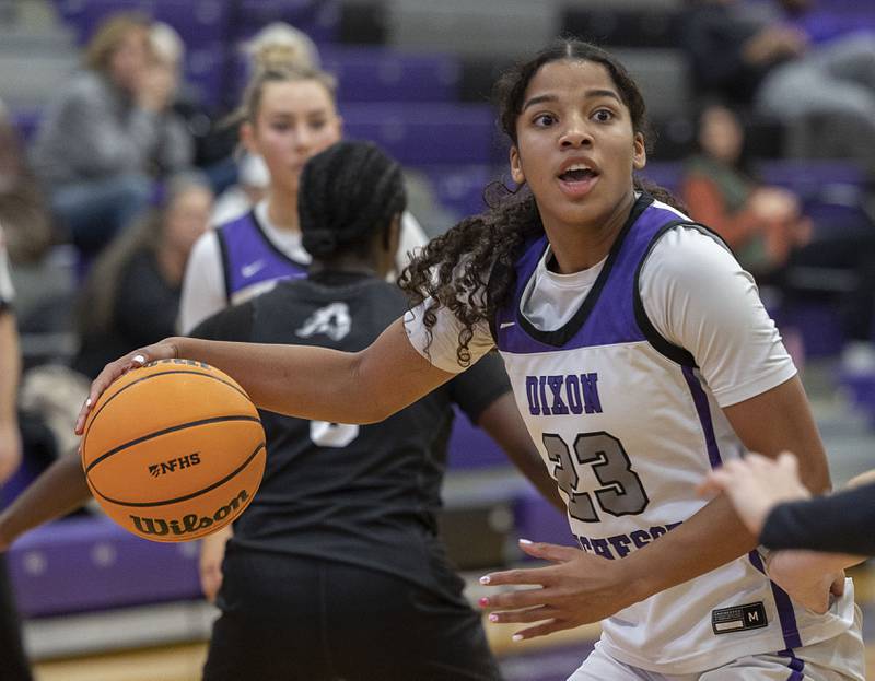 Dixon’s Ahmyrie McGowan handles the ball against Kaneland Wednesday, Dec. 10, 2025.