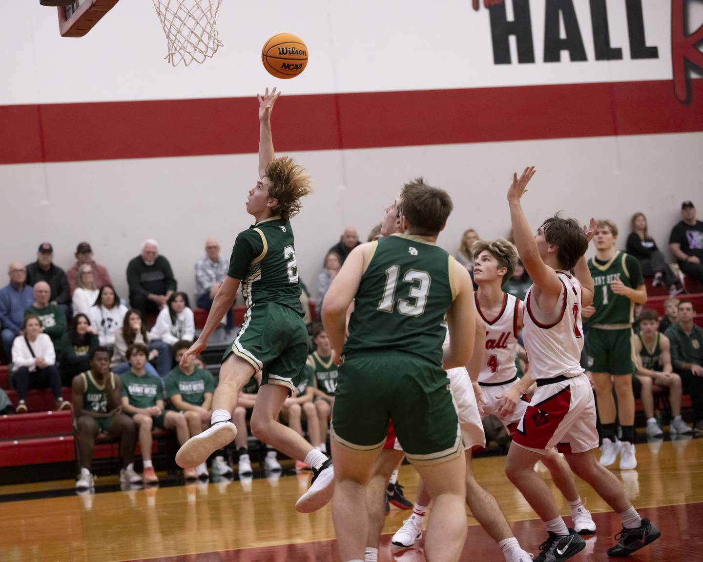 Kaden Nauman of St. Bede scores a layup against Hall High School during the Colmone Classic on December 7, 2024 at Hall High School.