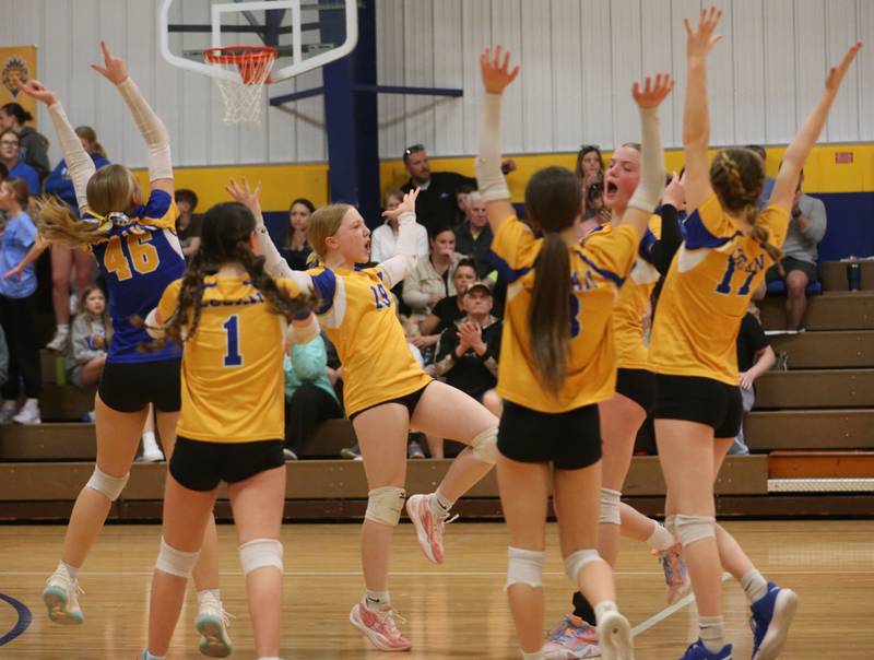 Members of the Logan eighth-grade girls volleball team react after scoring a point against Rockford-Marshall during the IESA Class 3A eighth-grade Regional final game on Thursday, March 13, 2025 at Logan Junior High School in Princeton.