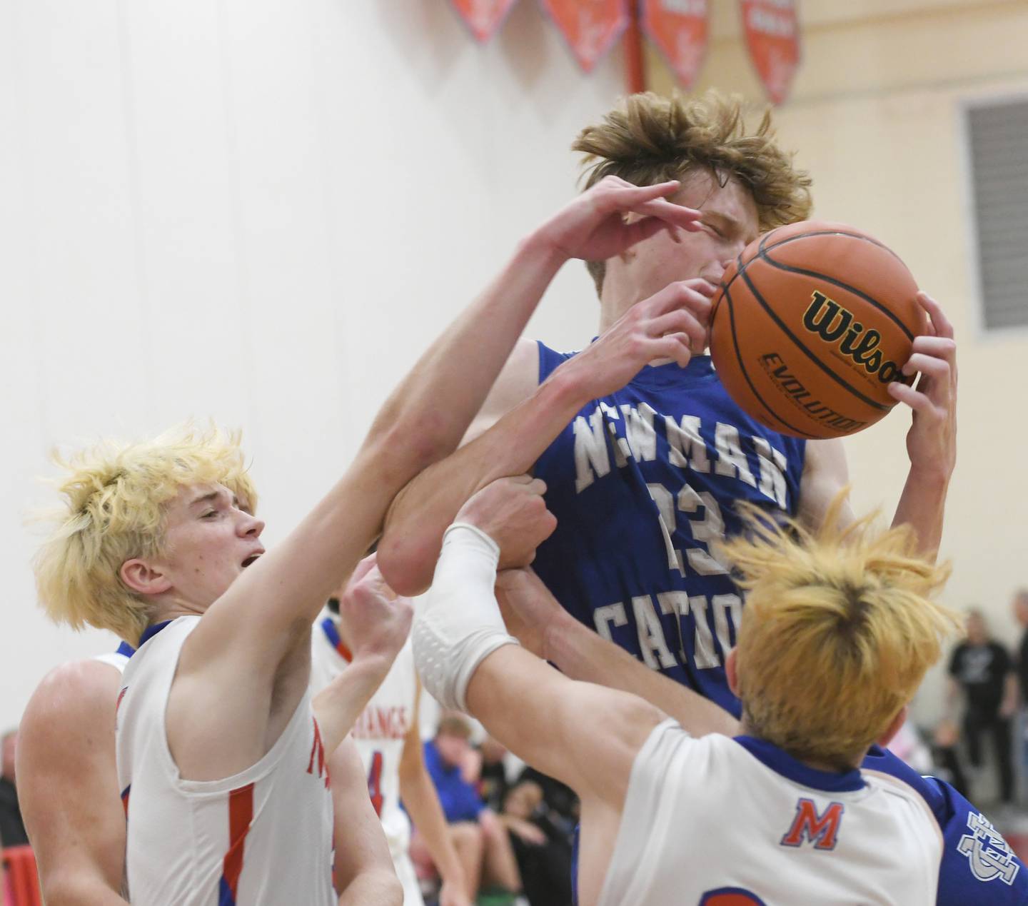 Newman's Lucas Simpson battles Morrison's Chase Newman and Danny Mouw during afternoon action at the Oregon Thanksgiving Tournament on Saturday, Nov. 26.