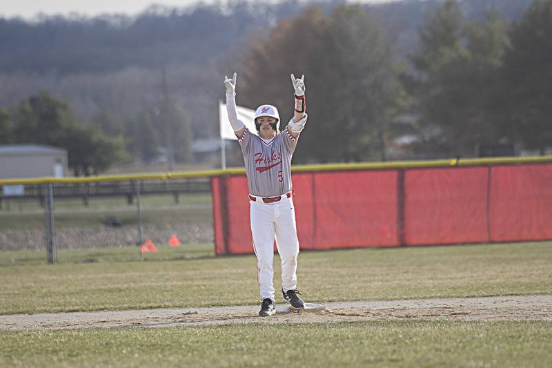 Oregon’s Logan Weems celebrates a two-run double against Amboy Thursday, March 21, 2024 in Oregon.